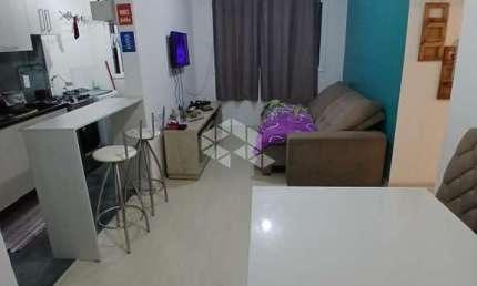 Apartamento 2 dormitórios, sala e Lavanderia integrado com cozinha estilo americana, à venda no Bairro São José/Canoas. Aceita fincanciamento FGTS