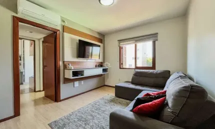 Apartamento 2 dormitórios, semimobiliado, churrasqueira, vaga coberta, localizado no bairro Jardim Mauá, próximo do Centro de Novo Hamburgo.
