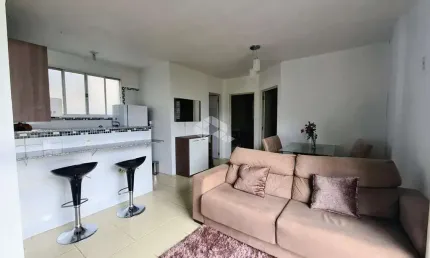 Apartamento com 2 dormitórios, 1 banheiro, 1 vaga de garagem, cozinha americana, mobiliado