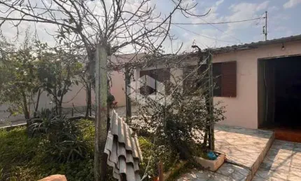 Casa com 3 quartos à venda na Trinta E Quatro, 6, Guajuviras, Canoas