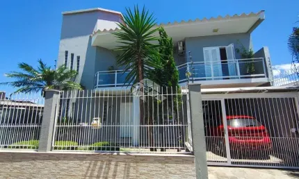 Sobrado 4 dormitórios sendo um suíte master com sacada Niterói Canoas