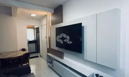 Apartamento dois dormitórios com sacada e suíte semi mobiliado