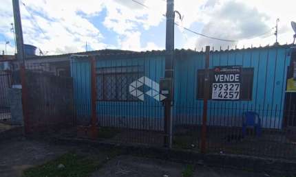Casa com 3 quartos à venda na Quadra J Cinco, 17, Guajuviras, Canoas