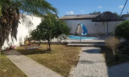 Casa com 3 quartos à venda na A Cinco, 18, Guajuviras, Canoas