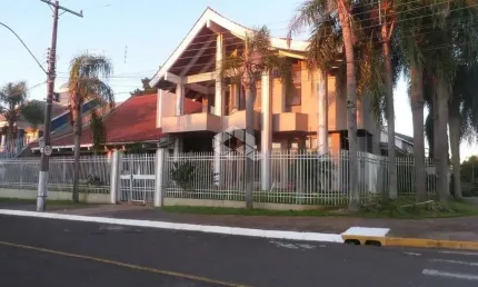 Casa/sobrado com 4 suítes, de esquina no bairro marechal rondon/canoas-rs.