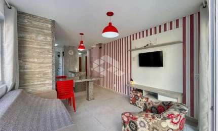 Apartamento com amplo terraço, 2 dormitórios com suíte em Capão da Canoa.