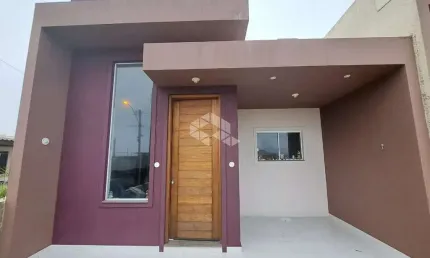 Casa 2 dormitórios sendo uma suíte, mobiliada, living, cozinha, terraço ,frente mar
