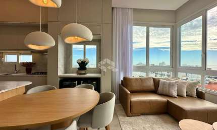 APARTAMENTO COM PÉ DIREITO DUPLO  À VENDA EM CAPÃO DA CANOA COM 3 DORMITÓRIOS!!