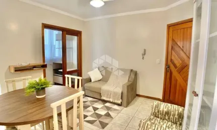 Apartamento de 2 dormitórios, mobiliado e decorado, lavabo, em capão da canoa