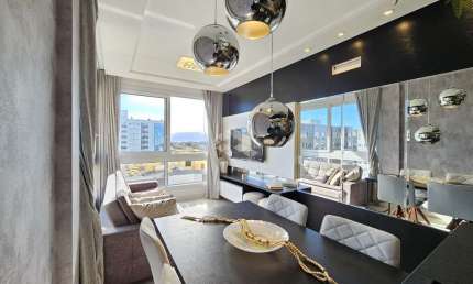 Apartamento à venda em Capão da Canoa com 2 quartos (1 suíte) - Mobiliado, decorado e a 350m do mar.