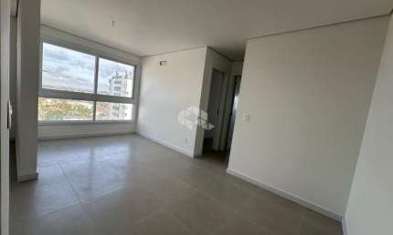 Apartamento novo 2 dormitórios, 1 suíte na cidade Capão da Canoa