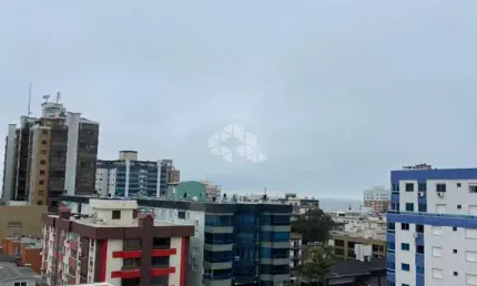 No centro dois dormitórios mobiliado novo em Capão da Canoa RS