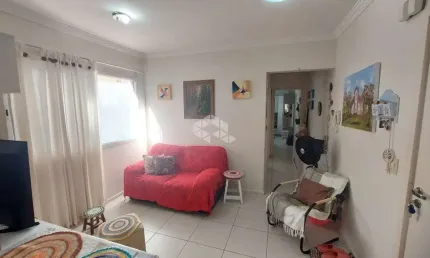 Apartamento à venda em capão da canoa, 2 dormitórios, 1 suíte, vaga de garagem e excelente localização