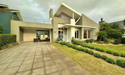 Casa térrea três suítes mobiliada Condado Capão da Canoa RS