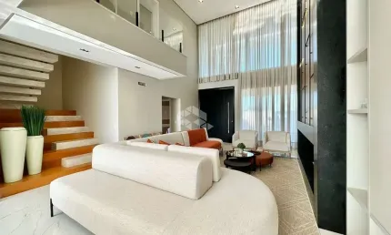 Belíssimo sobrado com 343 m² privativos, 04 suítes ( 01 térrea ) , 02 vagas/box, no condomínio Ilhas Resort, Capão da Canoa/RS