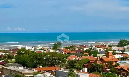 Apartamento com  03 suítes, lavabo, sacada de frente integrada, vista definida para o mar, infraestrutura, capão da canoa
