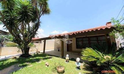 CASA TÉRREA, 3 DORMITÓRIOS, SUITE, 5 VAGAS E PISCINA EM IPANEMA