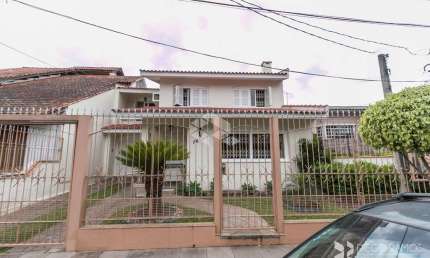 Casa com 4 quartos à venda na Rua Roque Gonzales, 76, Jardim Botânico, Porto Alegre