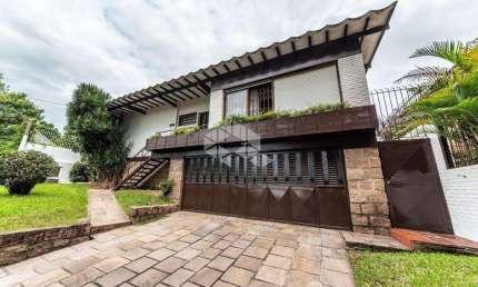 Casa com 3 quartos à venda na Rua João Paetzel, 821, Chácara das Pedras, Porto Alegre