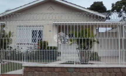 Casa com 3 quartos à venda na Rua Jataí, 291, Cristal, Porto Alegre