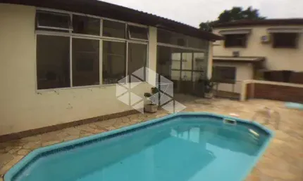 Casa com 4 quartos à venda na Rua Cangussu, 612, Nonoai, Porto Alegre