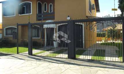 Casa com 3 quartos à venda na Rua Inhanduí, 340, Cristal, Porto Alegre