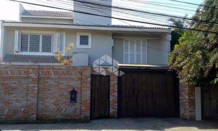 Casa Residencial À Venda com 6 dormitórios, Cristal, Porto Alegre.