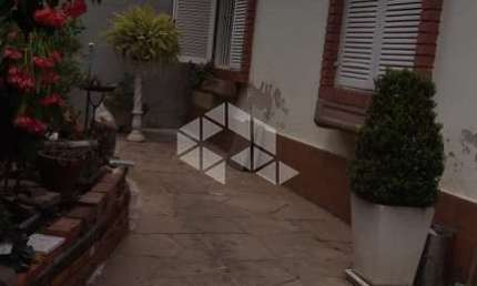 Casa com 4 quartos à venda na Rua Bernardo Guimarães, 148, Partenon, Porto Alegre