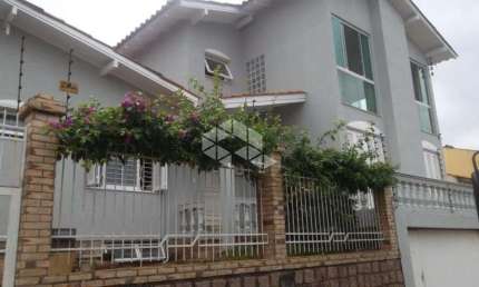 Casa com 4 quartos à venda na Avenida Doutor Rubem Knijnik, 589, Rubem Berta, Porto Alegre