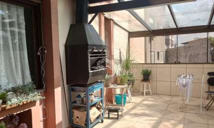 Apartamento garden com churrasqueira, dois banheiros, vaga de garagem