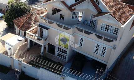 Casa com 4 Quartos e 6 Banheiros  em Santa Felicidade