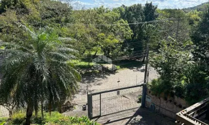 Casa com 3 quartos à venda na Rua Edgar Luiz Schneider, 480, Jardim Isabel, Porto Alegre