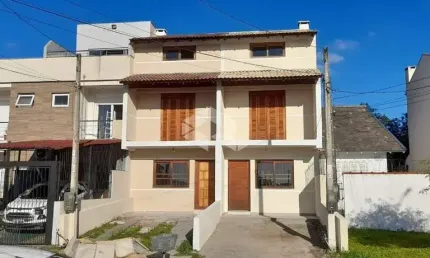 Casa com 3 quartos à venda na Rua Waldemar da Silva Tavares, 210, Guarujá, Porto Alegre