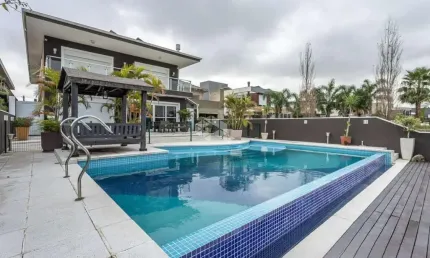 Casa em condomínio com 4 quartos, sendo 4 suítes, 506m², 4 vagas no bairro terra ville porto alegre