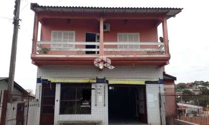 Casa 03 dormitórios com suite,  sendo mista residencia e comercial.