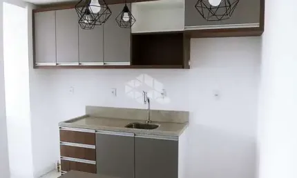 APARTAMENTO SEMIMOBILIADO COM 1 DORMITÓRIO E 1 VAGA ROTATIVA NO BAIRRO LOURDES EM CAXIAS DO SUL