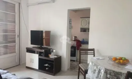 Apartamento de um dormitório com suíte no centro histórico