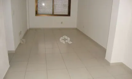 Apartamento um dormitório andar alto com piso porcelanato foi todo reformado