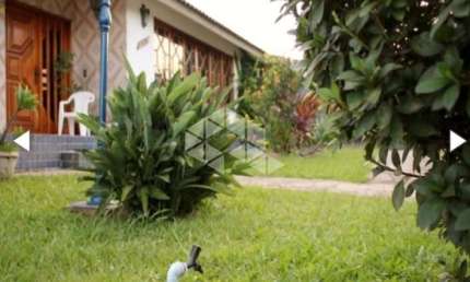 Crédito Real vendeCasa/Sobrado com 5 dormitorios/quartos e piscina no bairro parque Santa Fé em Porto Alegre-RS