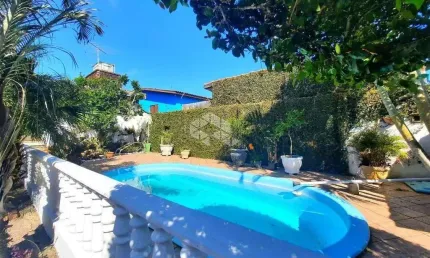 CASA COM 2 QUARTOS E 4 VAGAS COM PISCINA EM VIAMÃO RS