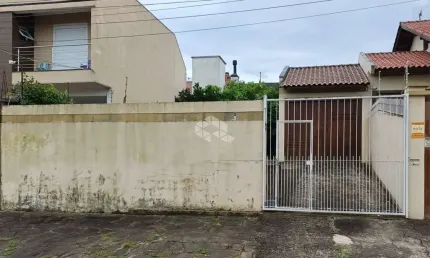 Terreno murado de 200m² no bairro igara, com garagem e portão eletrônico.