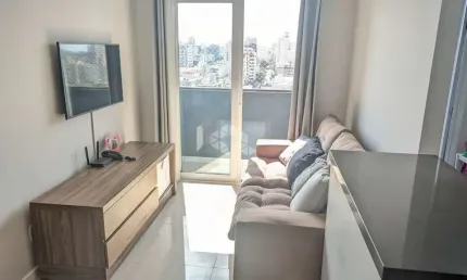 Apartamento de 2 quartos com churrasqueira e 1 vaga de garagem no centro de canoas.