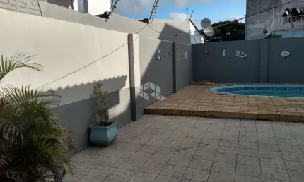 Casa  de 4 quartos, churrasqueira e piscina no bairro harmonia  em canoas rs
