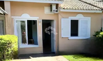 Casa dois dormitórios em condomínio rio branco canoas