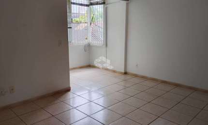 Credito Real vende aconchegante apartamento de 2 dormitórios, com churrasqueira  no Jardim Botânico - Porto Alegre/RS