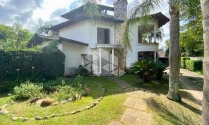 Casa / Sobrado 5 dormitórios 2 suítes 4 vagas em Ivoti - RS