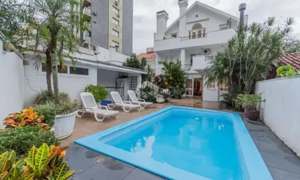 Casa com 307m² e 3 dormitórios no bairro Menino Deus em Porto Alegre para Comprar