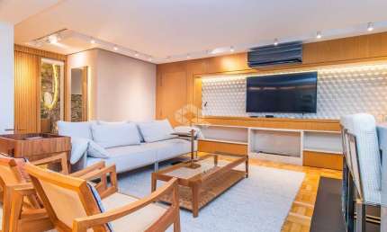 Apartamento à venda; mobiliado; com 127m² de área privativa; posição solar oeste/sul; 1 vaga vaga de garagem; no bairro Menino Deus, em Porto Alegre.