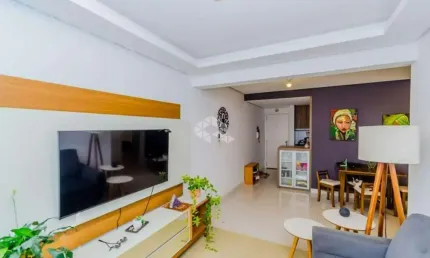 Apartamento de 2 quartos, suite, cozinha americana com churrasqueira, elevador e garagem escriturada