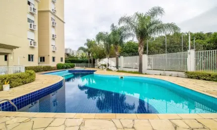 Excelente apartamento semi mobiliado de 02 dormitórios com 63 m² privativos e vaga coberta no bairro Passo da Areia em Porto Alegre